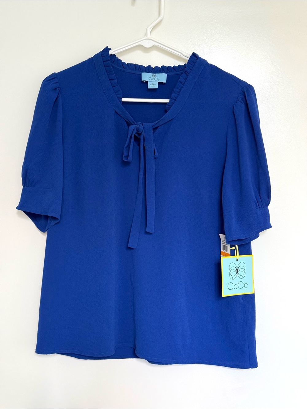 CeCe Ruffle Tie Neck Top in Vivid Blue, size S